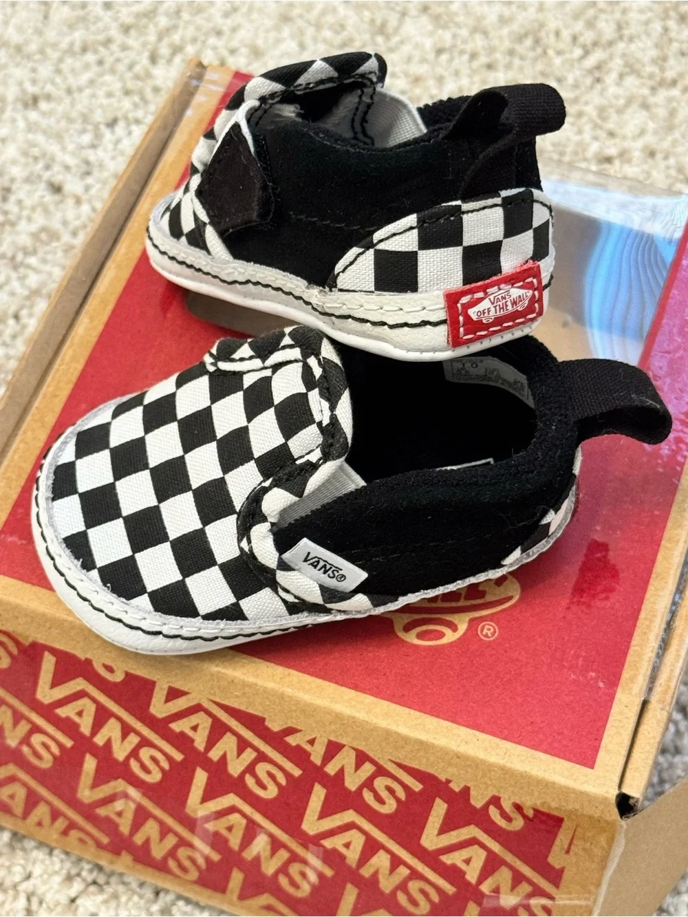 Vans Kids Black & White Checkerboard Slip-On Sneakers